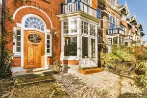 The front door and yard for a victorian terrance residential property.